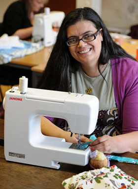 A photo of me sewing
